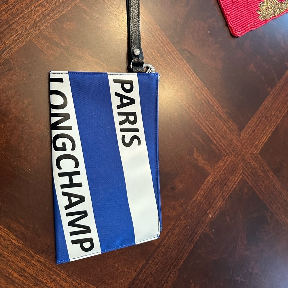 Longchamp Le Pliage Paris Zip wristlet.